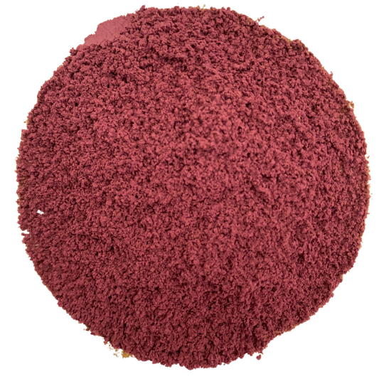Picture of purple water-soluble acai berry extract powder in the shape of a circle with white background