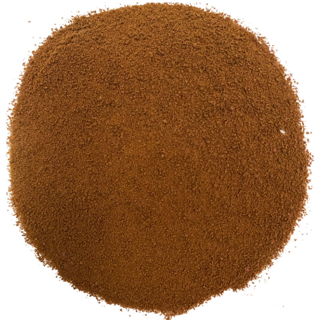 Picture of brown instant coffee powder in the shape of a circle with white background
